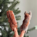Handmade felt squirrel finger puppets holding acorn and nut, eco-friendly wool toys for kids, storytelling, or woodland pretend play.