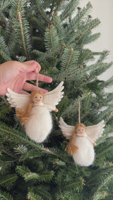 Best needle-felted white angel ornaments hand-crafted by Ganapati Crafts in Nepal using organic wool and eco-friendly dyes.