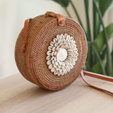 Bali Round Rattan Bag with Seashell Embellishment. Handmade in Bali by Ganapati Crafts Co.